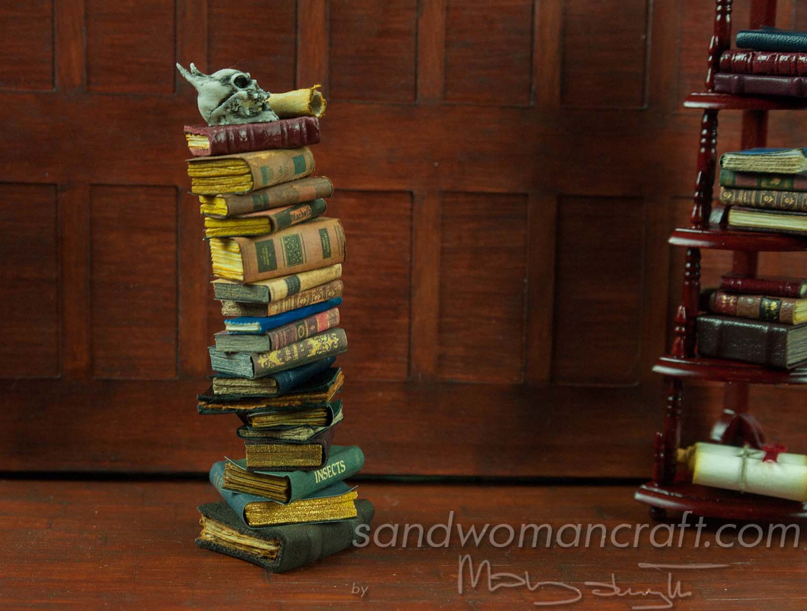Miniature book stack with Devil's skull