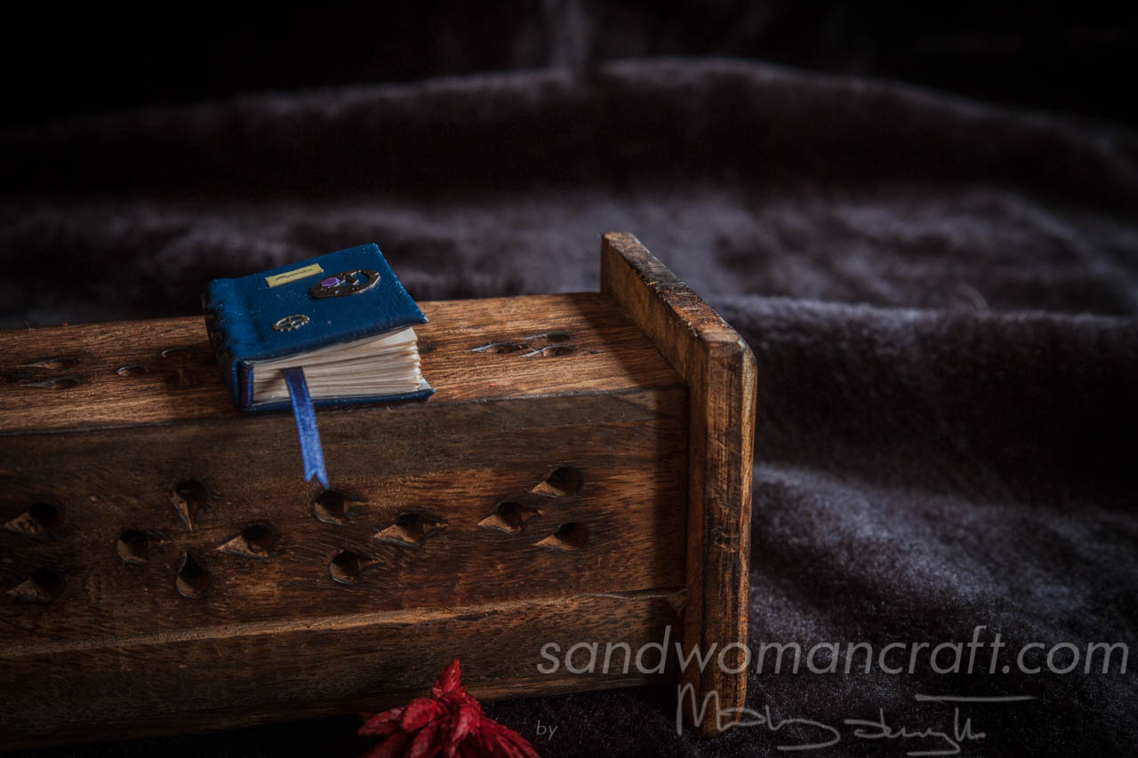 Blue leather miniature steampunk book