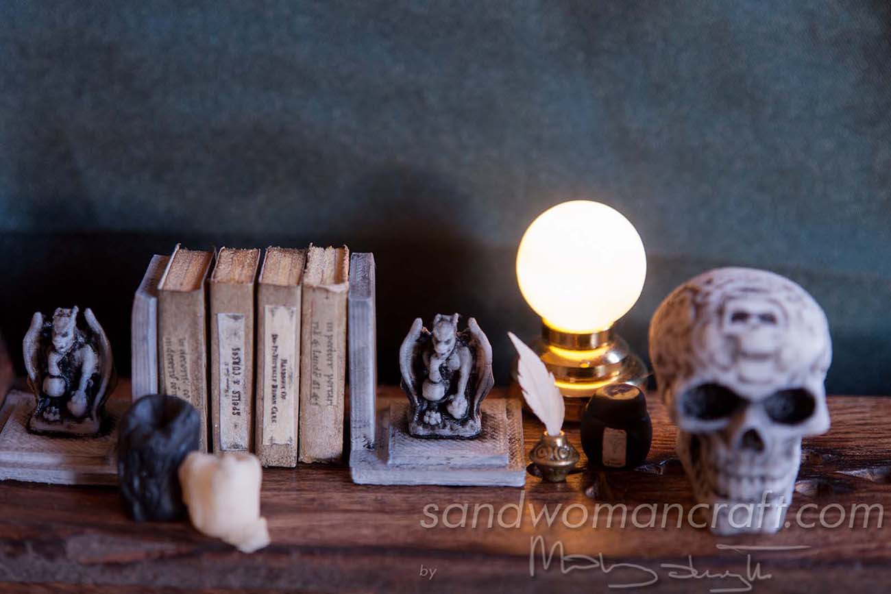 Miniature celtic skull, candles, book, lamp
