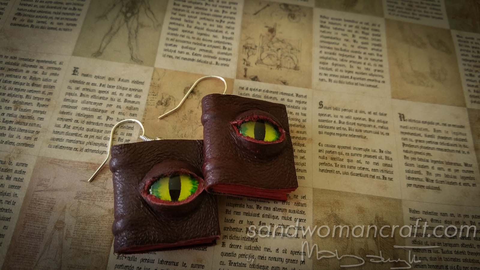 Miniature leather book earrings with glass dragon's eye cover