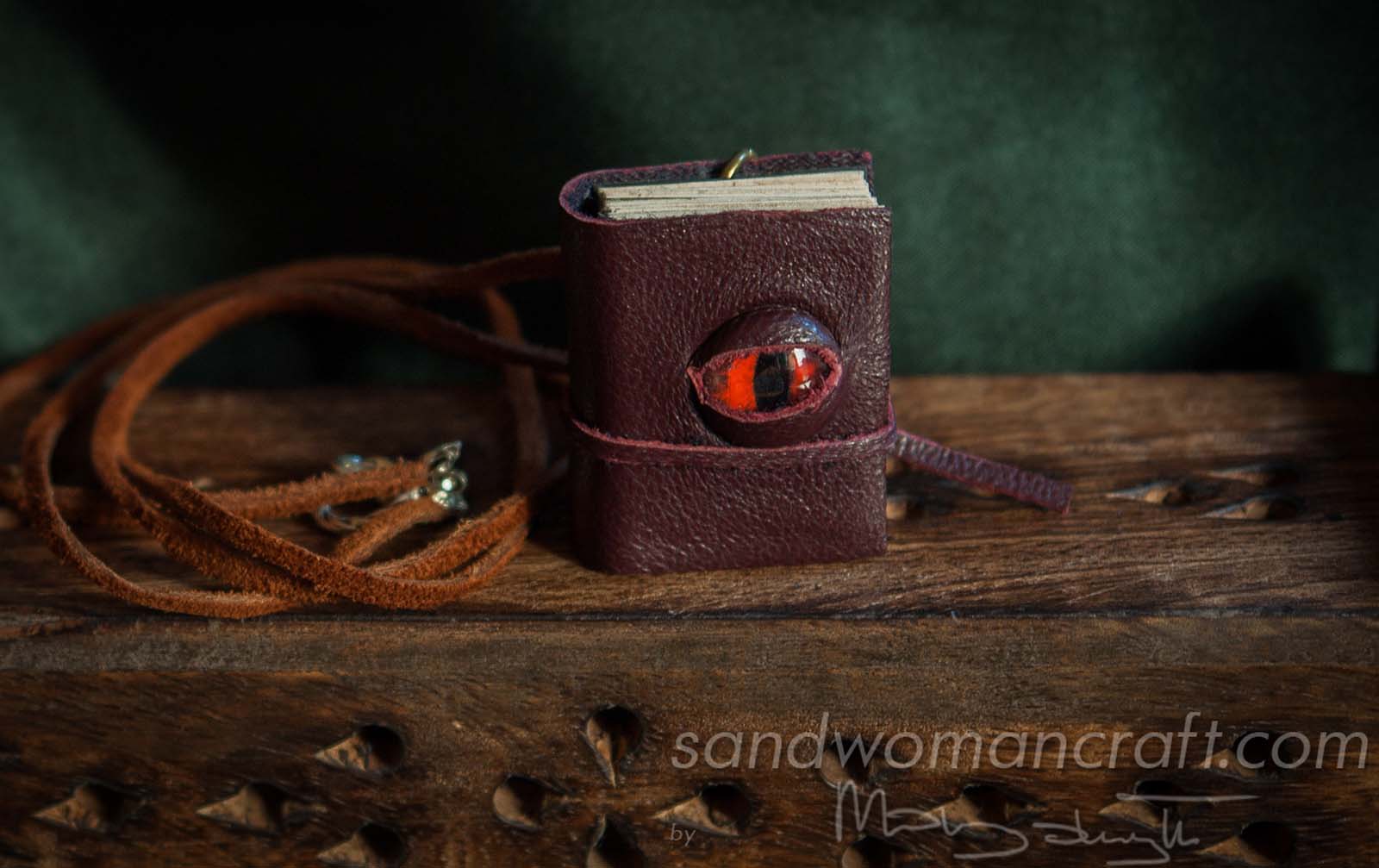Miniature leather book necklace with real medieval theme book inside