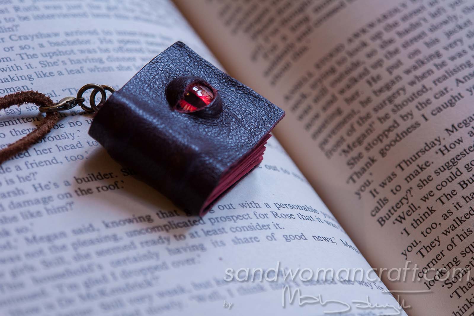 Miniature leather book necklace with Dragon's Eye
