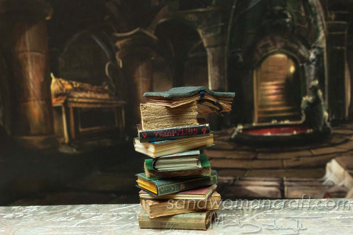 Miniature books stacked