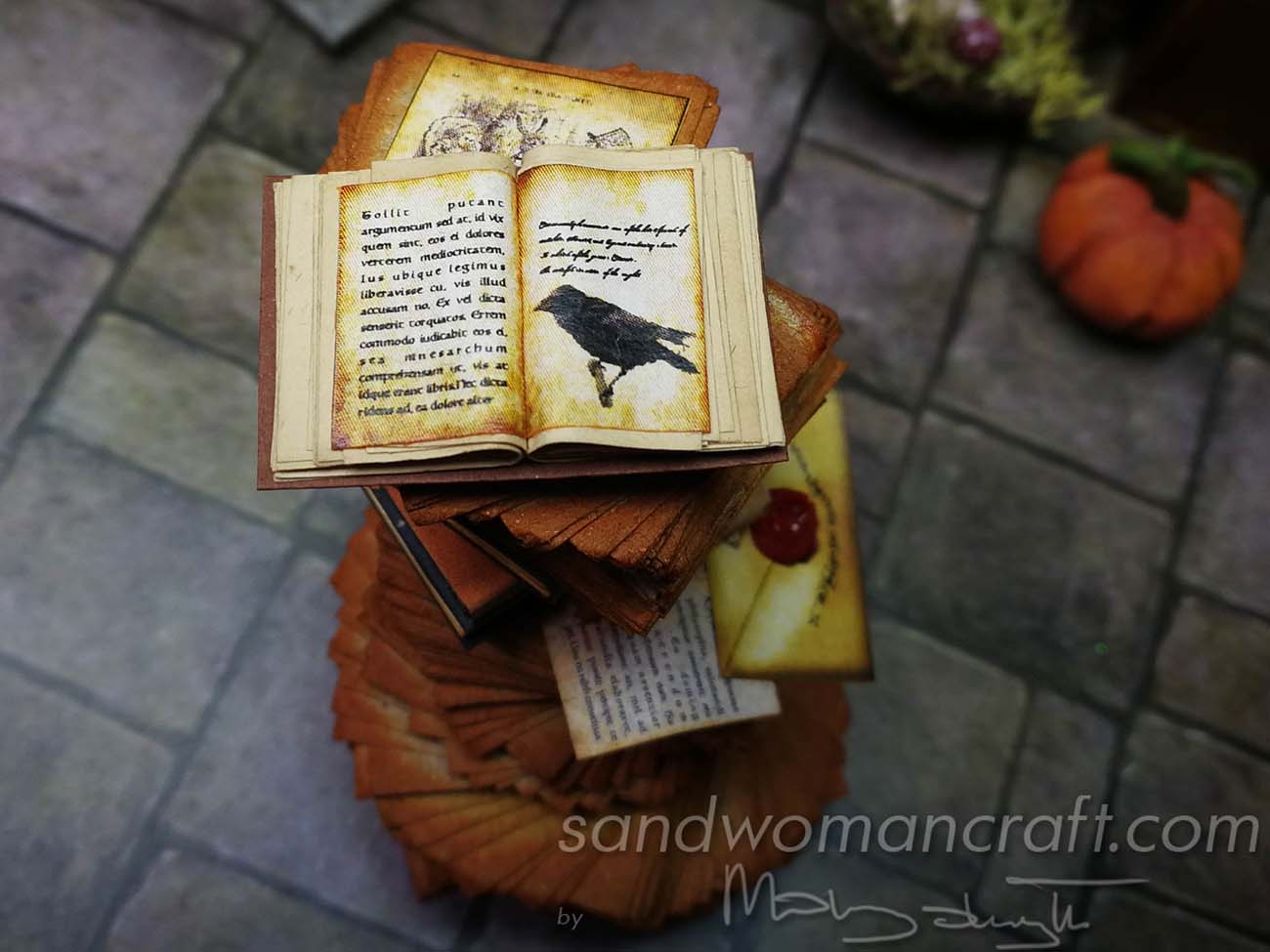 Miniature paper stack with Crow book and wax sealed envelope letter