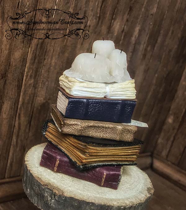 Miniature leather books with candles in 1:12 scale